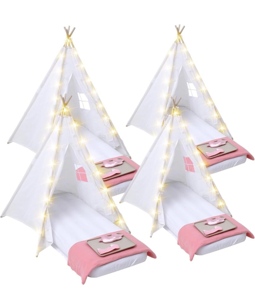 group of 4 white teepee tents with mattresses, blankets and lights
